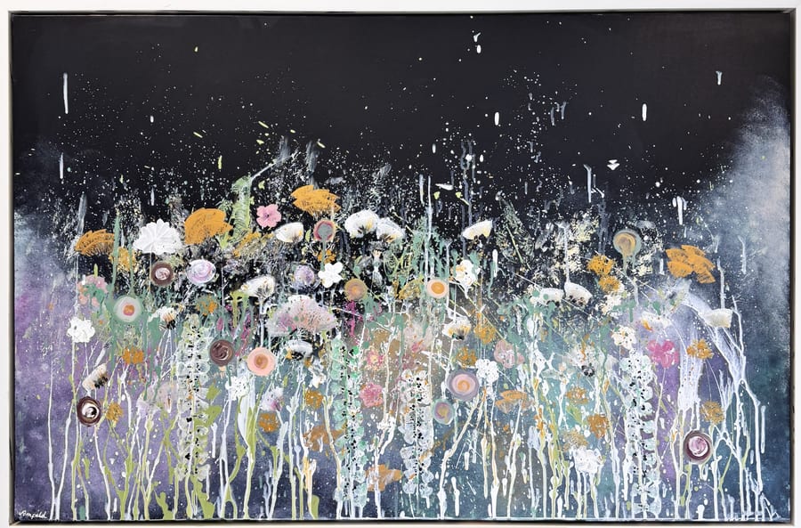 A wide black nightscape with a meadow of bright flowers rising through the dark.